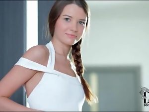 Teen looks perfect in white swimsuit