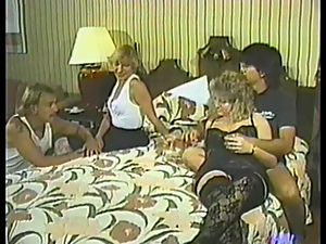 Retro video with kinky two swinger couples fucking in a bedroom