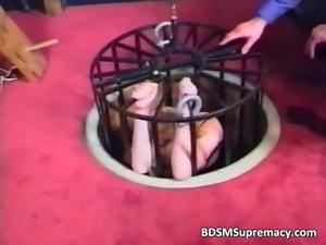 BDSM action wiht slut pussy is clamped